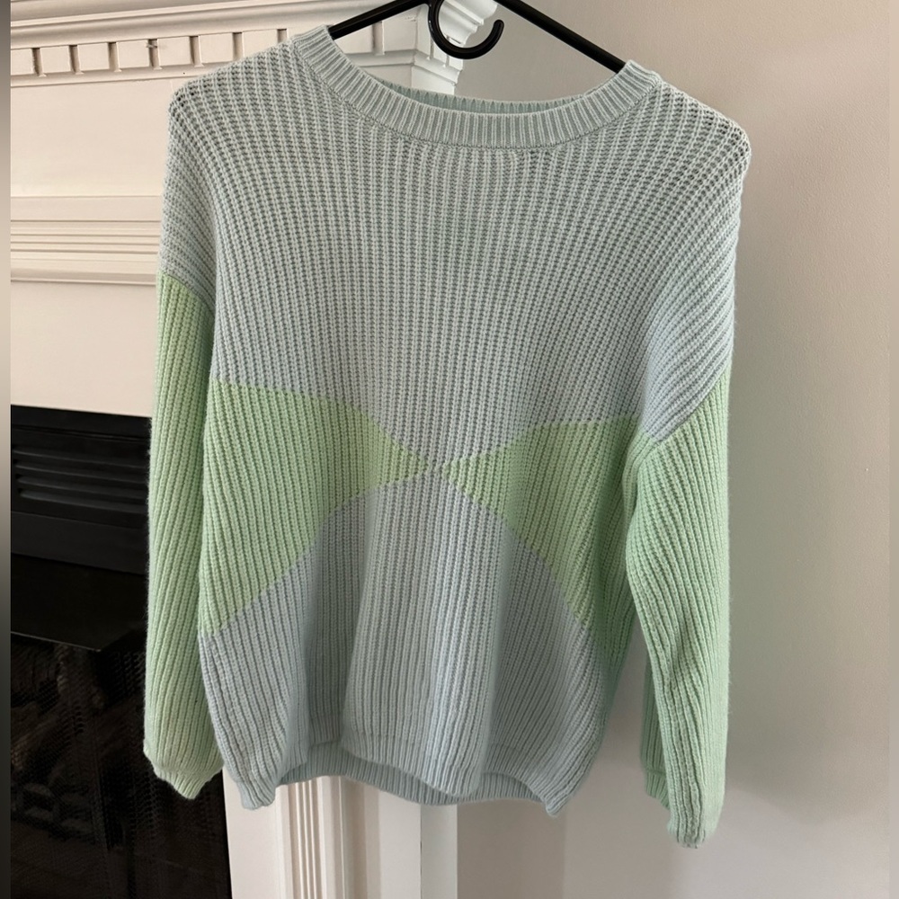 Like new Molly Green, mint colored crew neck sweater, size medium
